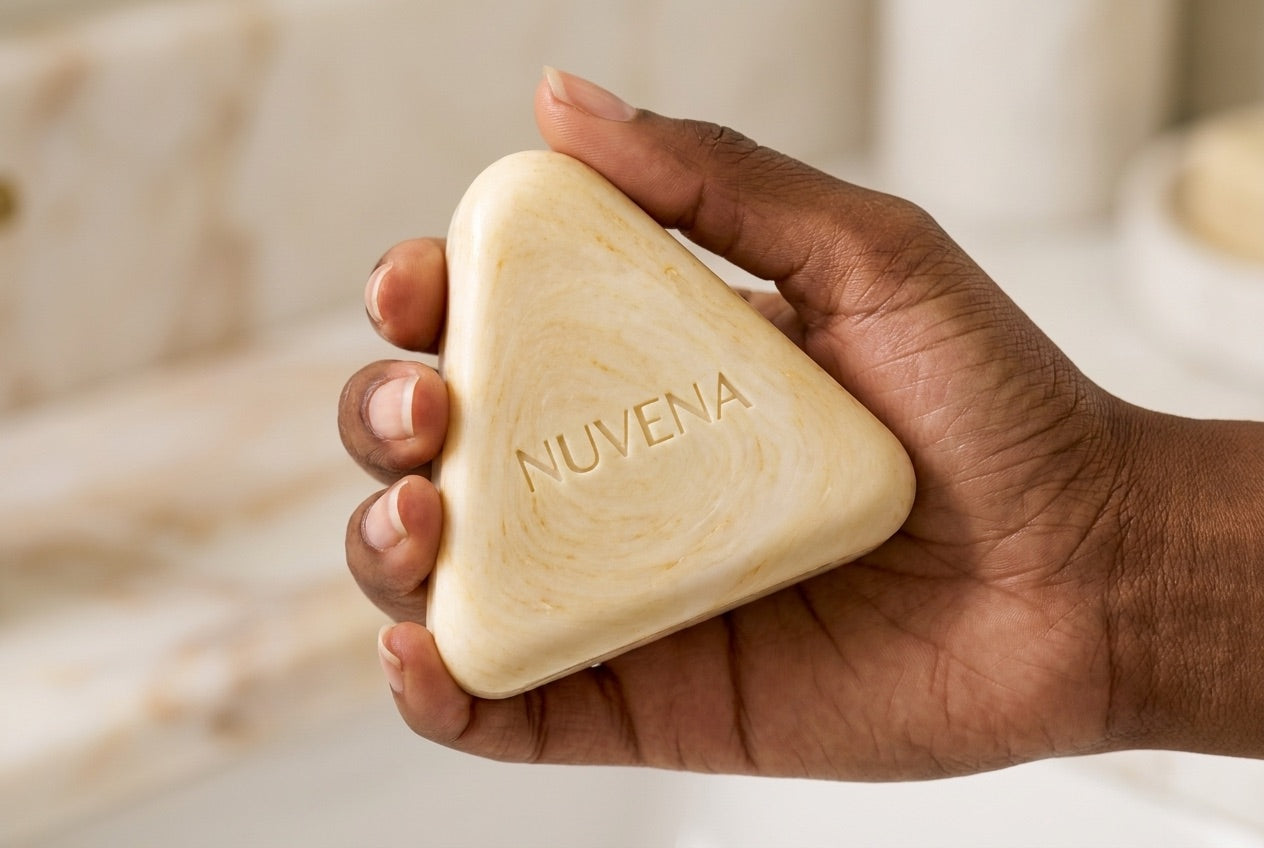 A hand holding the Nuvena Smooth Skin Bar